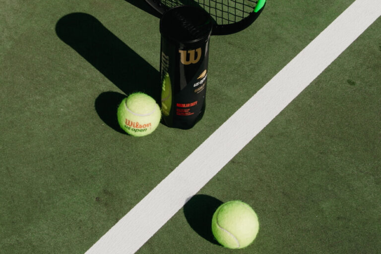 A pressurized tennis ball can