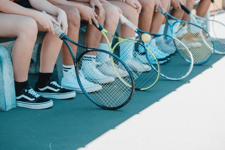 Tennis players sitting